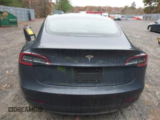 2022 Tesla Model 3 with VIN 5YJ3E1EA7NF339952, listed as a IAAI auction lot 38007332 with 10,726 mi miles. Bid and sale history available at carsss.com. Image 16.