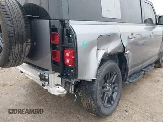 2024 Land Rover Defender with VIN SALEJEEU9R2312923, listed as a IAAI auction lot 41548930 with 104,449 mi miles and . Bid and sale history available at DreamBid. Image 6.