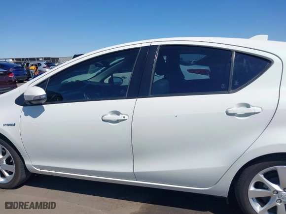 2015 Toyota Prius c One with VIN JTDKDTB37F1089798, listed as a IAAI auction lot 41838827 with 137,655 mi miles. Bid and sale history available at carsss.com. Image 14.