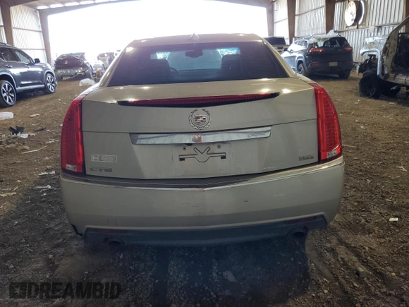 2013 Cadillac CTS Performance with VIN 1G6DK5E30D0157791, listed as a Copart auction lot 83798544 with 124,638 mi miles and Salvage Title. Bid and sale history available at DreamBid. Image 6.