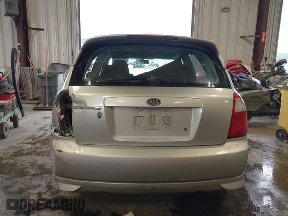 2006 Kia Spectra with VIN KNAFE161X65283615, listed as a IAAI auction lot 41955968 with 185,177 mi miles. Bid and sale history available at carsss.com. Image 16.