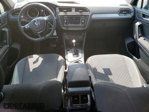 2018 Volkswagen Tiguan S with VIN 3VV1B7AX9JM020833, listed as a Copart auction lot 54539565 with 69,904 mi miles and Salvage title. Bid and sale history available at DreamBid. Image 8.