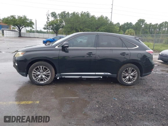 2013 Lexus RX 450h with VIN JTJZB1BA3D2006802, listed as a IAAI auction lot 42720067 with 117,291 mi miles and . Bid and sale history available at DreamBid. Image 14.