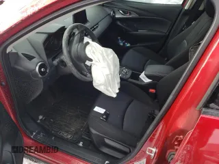 2021 Mazda CX-3 Touring z VIN JM1DKFC73M1503805, wystawiony jako Copart lot #38996603 z przebiegiem Nie podano mil oraz . Historia ofert i sprzedaży dostępna na DreamBid. Obrazek 7.