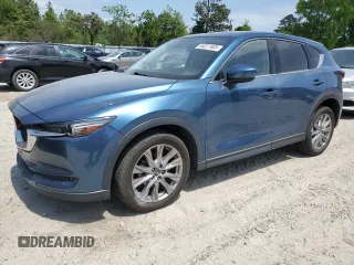2020 Mazda CX-5 Grand Touring with VIN JM3KFBDM7L0773091, listed as a Copart auction lot 55221905 with 78,487 mi miles and Salvage title. Bid and sale history available at DreamBid. Image 1.