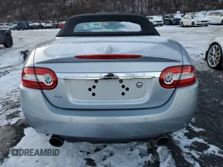 2010 Jaguar XK with VIN SAJWA4GB7ALB35518, listed as a Copart auction lot 86475814 with 32,910 mi miles and Salvage Title. Bid and sale history available at carsss.com. Image 6.