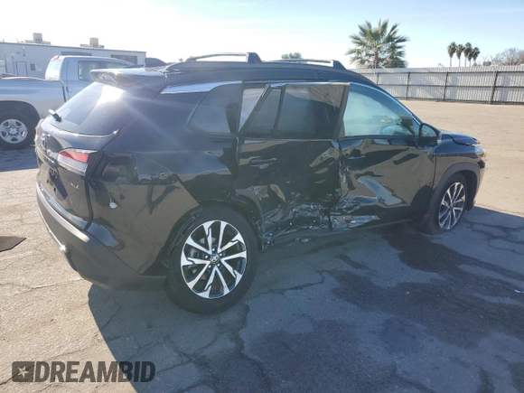 2024 Toyota Corolla Cross XLE with VIN 7MUDAAAGXRV073103, listed as a Copart auction lot 86753294 with 5,667 mi miles and Salvage title. Bid and sale history available at DreamBid. Image 3.