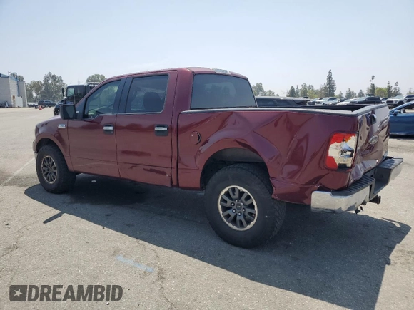 2005 Ford F-150 XLT with VIN 1FTPW125X5KF09293, listed as a Copart auction lot 60921515 with 154,521 mi miles and Salvage title. Bid and sale history available at DreamBid. Image 2.