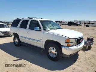 2001 GMC Yukon SLT z VIN 1GKEC13T81J152049, wystawiony jako Copart lot #56494675 z przebiegiem 160 102 mil mil oraz Szkoda całkowita • Salvage title. Historia ofert i sprzedaży dostępna na DreamBid. Obrazek 4.