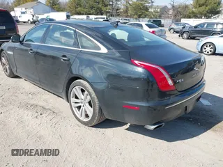 2013 Jaguar XJ Portfolio with VIN SAJWJ2GDXD8V55879, listed as a IAAI auction lot 41568366 with 121,119 mi miles and . Bid and sale history available at DreamBid. Image 3.