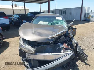 2016 Nissan Altima S z VIN 1N4AL3AP2GN313918, wystawiony jako IAAI lot #42193079 z przebiegiem 111 007 mil mil oraz . Historia ofert i sprzedaży dostępna na DreamBid. Obrazek 13.