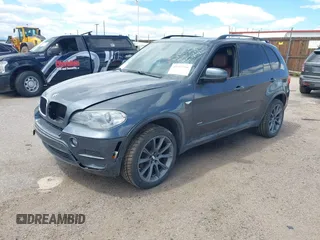 2012 BMW X5 35i z VIN 5UXZV4C53CL987556, wystawiony jako IAAI lot #42297756 z przebiegiem 190 922 mil mil oraz . Historia ofert i sprzedaży dostępna na DreamBid. Obrazek 17.