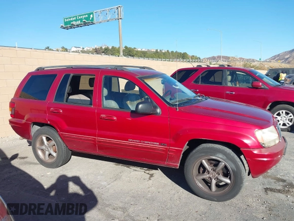 2002 Jeep Grand Cherokee Limited with VIN 1J8GX58N92C186560, listed as a IAAI auction lot 41383003 with 206,195 mi miles and . Bid and sale history available at DreamBid. Image 13.