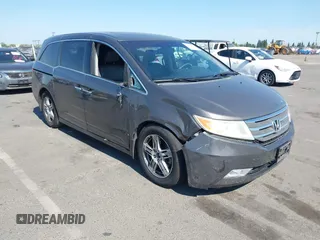 2012 Honda Odyssey Touring с VIN 5FNRL5H95CB049067, выставлен на аукционе IAAI как лот 42461773 с пробегом 129 966 миль миль и . История ставок и продаж доступна на DreamBid. Изображение 1.