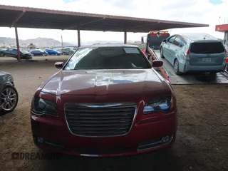 2014 Chrysler 300 S with VIN 2C3CCABG4EH254029, listed as a IAAI auction lot 41711501 with 161,067 mi miles and . Bid and sale history available at carsss.com. Image 12.