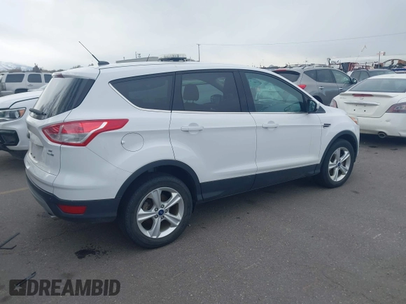 2013 Ford Escape SE with VIN 1FMCU9GX5DUD54132, listed as a IAAI auction lot 41946355 with 80,969 mi miles. Bid and sale history available at carsss.com. Image 4.