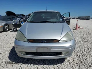 2001 Ford Focus ZX3 z VIN 3FAFP313X1R243418, wystawiony jako Copart lot #48558175 z przebiegiem 43 257 mil mil oraz Szkoda całkowita • Salvage title. Historia ofert i sprzedaży dostępna na DreamBid. Obrazek 5.