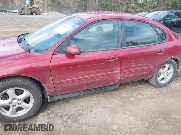 2003 Ford Taurus SE Standard with VIN 1FAFP53UX3G108418, listed as a IAAI auction lot 42042047 with 194,683 mi miles. Bid and sale history available at carsss.com. Image 6.