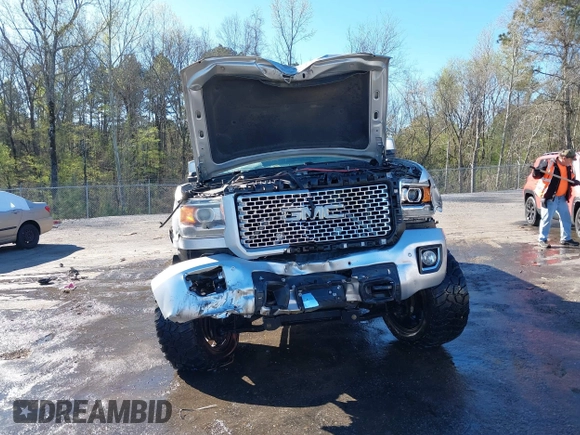 2015 GMC Sierra 2500HD available WiFi Denali with VIN 1GT120E87FF173940, listed as a IAAI auction lot 41843586 with 167,992 mi miles. Bid and sale history available at carsss.com. Image 13.