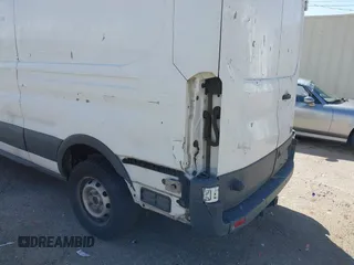 2016 Ford Transit Cargo z VIN 1FTYR2CG7GKB54149, wystawiony jako IAAI lot #41631962 z przebiegiem 151 824 mil mil oraz . Historia ofert i sprzedaży dostępna na DreamBid. Obrazek 17.