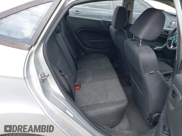 2013 Ford Fiesta SE z VIN 3FADP4BJ3DM207999, wystawiony jako IAAI lot #41880992 z przebiegiem 133 443 mil mil oraz . Historia ofert i sprzedaży dostępna na DreamBid. Obrazek 8.