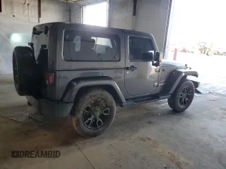 2017 Jeep Wrangler Sahara z VIN 1C4AJWBG6HL582839, wystawiony jako Copart lot #52049725 z przebiegiem 143 544 mil mil oraz Szkoda całkowita • Salvage title. Historia ofert i sprzedaży dostępna na DreamBid. Obrazek 3.