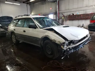 1999 Subaru Legacy Outback with VIN 4S3BG6853X7651034, listed as a Copart auction lot 85968574 with 201,205 mi miles and Salvage title. Bid and sale history available at DreamBid. Image 4.