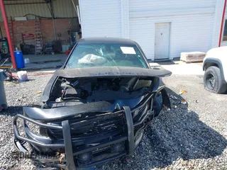 2021 Dodge Charger Police with VIN 2C3CDXAT2MH551264, listed as a IAAI auction lot 42210195 with 58,268 mi miles and . Bid and sale history available at DreamBid. Image 13.