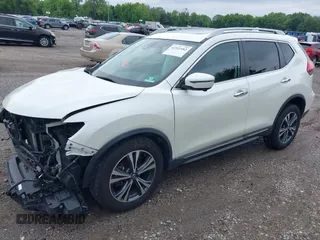 2017 Nissan Rogue SV with VIN 5N1AT2MVXHC844775, listed as a IAAI auction lot 42351482 with 87,195 mi miles and . Bid and sale history available at DreamBid. Image 2.