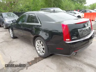 2009 Cadillac CTS AWD w/1SB with VIN 1G6DT57V290165006, listed as a IAAI auction lot 42144947 with 162,969 mi miles. Bid and sale history available at carsss.com. Image 3.