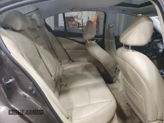 2014 Infiniti Q50 Hybrid Sport with VIN JN1AV7AR9EM702123, listed as a Copart auction lot 50310765 with 134,433 mi miles and Salvage Title. Bid and sale history available at DreamBid. Image 10.