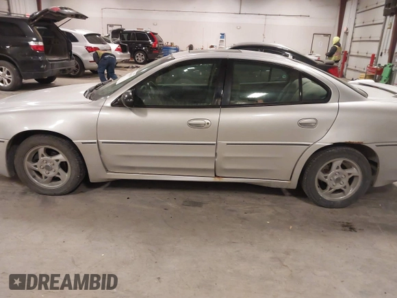 2003 Pontiac Grand Am GT with VIN 1G2NW52E93M605453, listed as a IAAI auction lot 41546839 with 202,918 mi miles. Bid and sale history available at carsss.com. Image 14.
