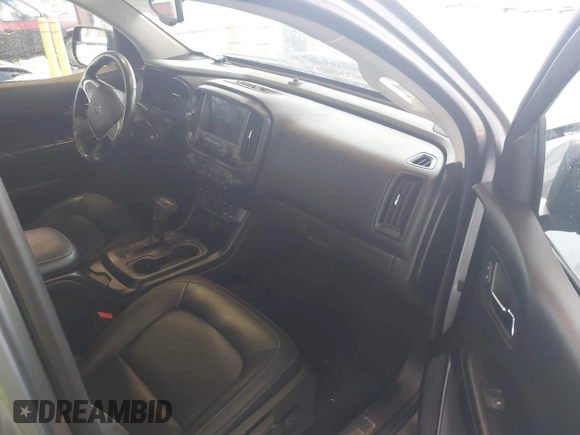 2018 Chevrolet Colorado 4WD ZR2 with VIN 1GCGTEEN9J1325135, listed as a IAAI auction lot 41869769 with 77,327 mi miles. Bid and sale history available at carsss.com. Image 5.