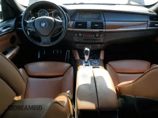 2013 BMW X6 xDrive35i z VIN 5UXFG2C50DL785065, wystawiony jako Copart lot #57036985 z przebiegiem 135 515 mil mil oraz Tytuł czysty. Historia ofert i sprzedaży dostępna na DreamBid. Obrazek 8.