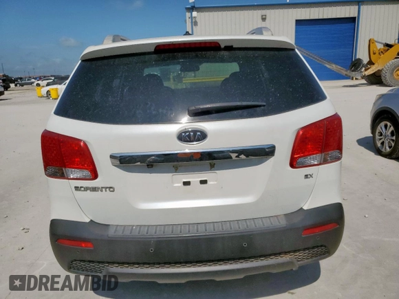 2012 Kia Sorento EX z VIN 5XYKU4A64CG271617, wystawiony jako Copart lot #64901615 z przebiegiem 127 061 mil mil oraz Czysty tytuł • Clean title. Historia ofert i sprzedaży dostępna na DreamBid. Obrazek 6.