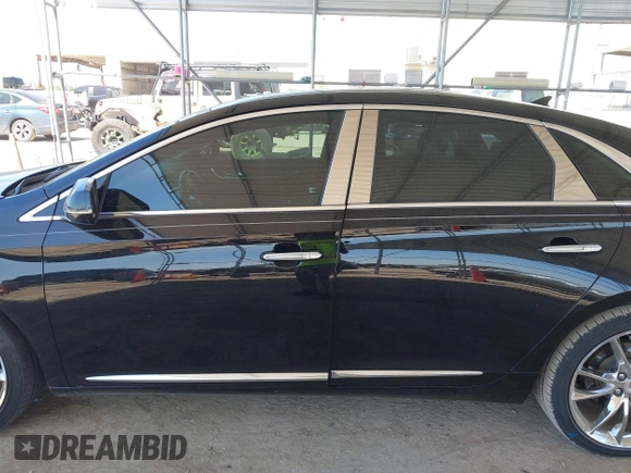 2013 Cadillac XTS Premium z VIN 2G61S5S36D9128244, wystawiony jako IAAI lot #41976485 z przebiegiem 88 033 mil mil oraz . Historia ofert i sprzedaży dostępna na DreamBid. Obrazek 14.