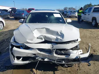 2013 BMW 3 Series 328i with VIN WBA3C1G55DNR49447, listed as a IAAI auction lot 41296098 with 126,605 mi miles and . Bid and sale history available at DreamBid. Image 6.