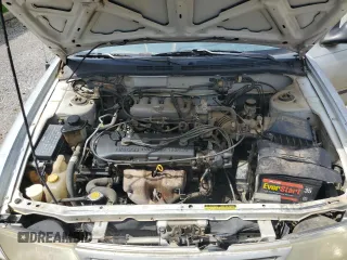 1996 Nissan Sentra XE z VIN 3N1AB41DXTL004753, wystawiony jako Copart lot #47585125 z przebiegiem 239 957 mil mil oraz Szkoda całkowita • Salvage title. Historia ofert i sprzedaży dostępna na DreamBid. Obrazek 11.