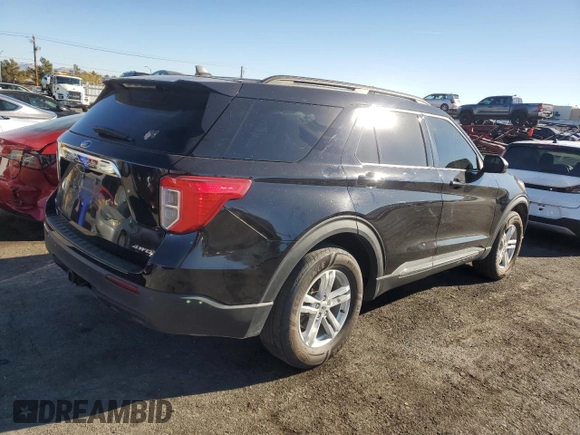 2022 Ford Explorer XLT with VIN 1FMSK8DH7NGA36201, listed as a Copart auction lot 86916034 with 71,436 mi miles and Salvage Title. Bid and sale history available at DreamBid. Image 3.