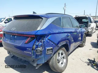 2023 Hyundai Tucson SEL z VIN 5NMJBCAE3PH204442, wystawiony jako IAAI lot #41831450 z przebiegiem 50 812 mil mil oraz . Historia ofert i sprzedaży dostępna na DreamBid. Obrazek 4.