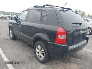 2009 Hyundai Tucson GLS with VIN KM8JM12B59U990027, listed as a IAAI auction lot 42195935 with 170,875 mi miles. Bid and sale history available at carsss.com. Image 3.