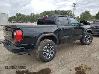 2024 GMC Canyon 4WD AT4 with VIN 1GTP6DEK3R1219220, listed as a Copart auction lot 68636524 with 401 mi miles and Salvage Title. Bid and sale history available at carsss.com. Image 3.