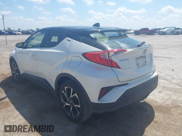 2019 Toyota C-HR XLE z VIN JTNKHMBX8K1061351, wystawiony jako IAAI lot #42053354 z przebiegiem 76 000 mil mil oraz . Historia ofert i sprzedaży dostępna na DreamBid. Obrazek 3.