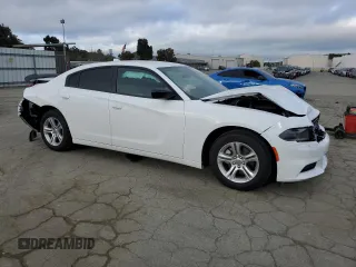 2023 Dodge Charger SXT with VIN 2C3CDXBG5PH703978, listed as a Copart auction lot 50657745 with 7,198 mi miles and Salvage Title. Bid and sale history available at carsss.com. Image 4.