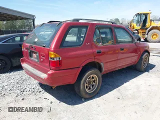 1999 Isuzu Rodeo S with VIN 4S2CM58W1X4356519, listed as a IAAI auction lot 41693480 with 225,839 mi miles and . Bid and sale history available at DreamBid. Image 4.