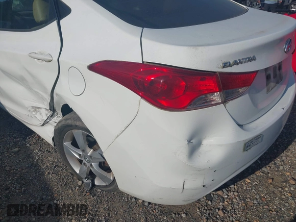 2013 Hyundai Elantra GLS z VIN 5NPDH4AE2DH324863, wystawiony jako IAAI lot #42177395 z przebiegiem 140 197 mil mil oraz . Historia ofert i sprzedaży dostępna na DreamBid. Obrazek 6.