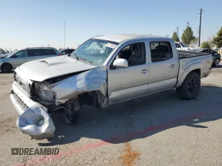 2010 Toyota Tacoma PreRunner with VIN 3TMJU4GN4AM099731, listed as a Copart auction lot 63714305 with Not provided miles and Salvage title. Bid and sale history available at DreamBid. Image 1.