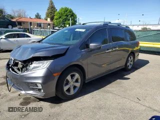 2018 Honda Odyssey EX-L z VIN 5FNRL6H72JB049951, wystawiony jako Copart lot #57283145 z przebiegiem 92 655 mil mil oraz Szkoda całkowita • Salvage title. Historia ofert i sprzedaży dostępna na DreamBid. Obrazek 1.