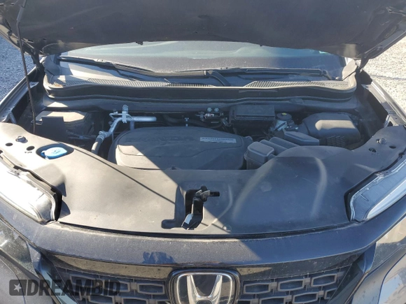 2019 Honda Passport EX-L z VIN 5FNYF8H5XKB020289, wystawiony jako Copart lot #42384545 z przebiegiem 65 083 mil mil oraz Szkoda całkowita • Salvage title. Historia ofert i sprzedaży dostępna na DreamBid. Obrazek 12.