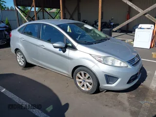 2011 Ford Fiesta SE z VIN 3FADP4BJ2BM240537, wystawiony jako IAAI lot #42357187 z przebiegiem 182 152 mil mil oraz . Historia ofert i sprzedaży dostępna na DreamBid. Obrazek 1.